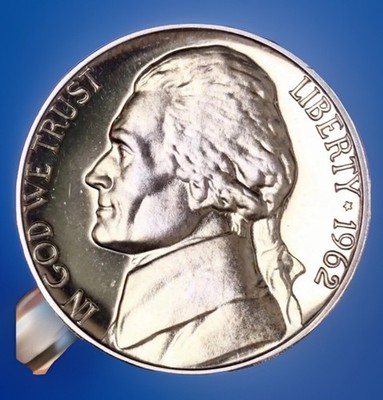Close-up of 1962 Jefferson nickel Full Steps designation showing five distinct separated horizontal step lines at the base of Monticello
