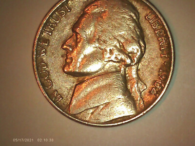 Close-up of 1962-D Jefferson nickel showing Repunched Mint Mark with secondary D impression visible offset from primary D mark between Monticello and rim